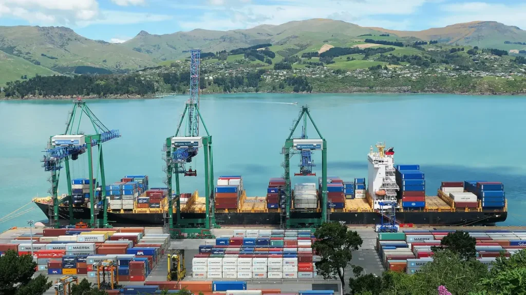 Container cranes and stacked containers at the Port of Lyttelton, New Zealand