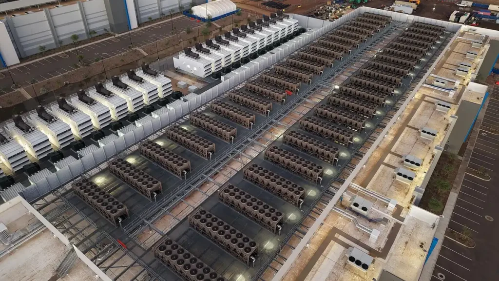 Rows of cooling units on the roof of a large data centre