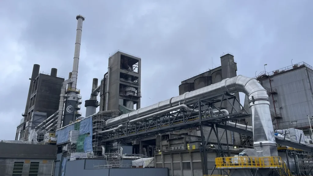 Carbon capture plant with pipes and towers at a cement factory in Brevik, Norway