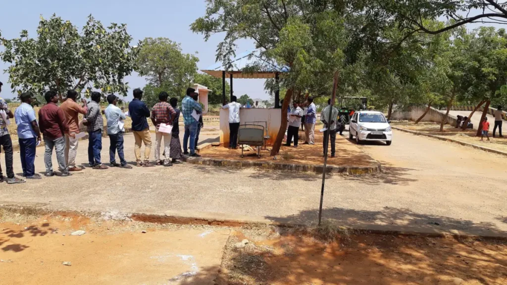 Applicants waiting outside an RTO office for driving licence tests in Tamil Nadu