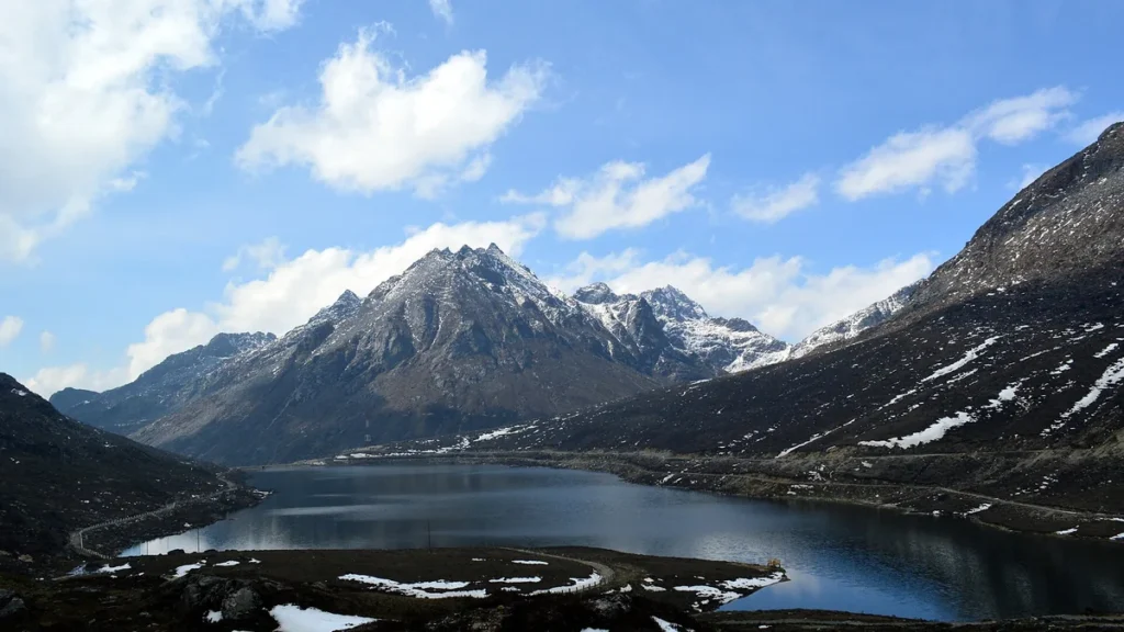 Snow-capped peaks above a lake at Sela Pass in Arunachal Pradesh