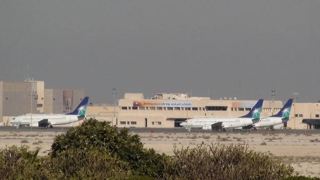 Aircraft parked on the apron of King Fahd International Airport in Dammam, Saudi Arabia