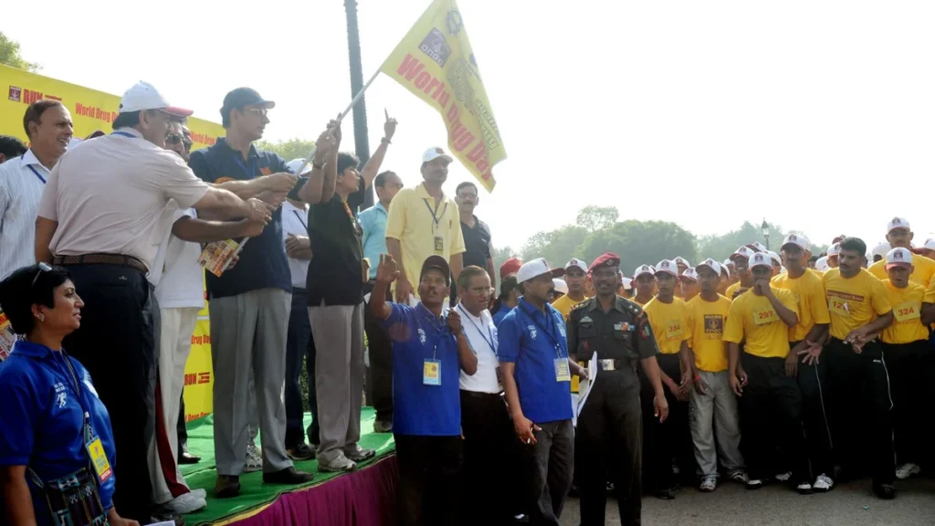 Young volunteers in caps at a run against drug abuse in New Delhi