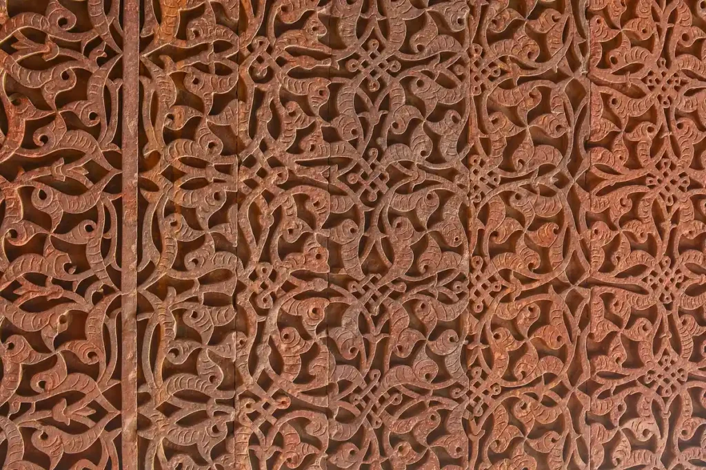 Art work on the wall of Qutb Minar Complex