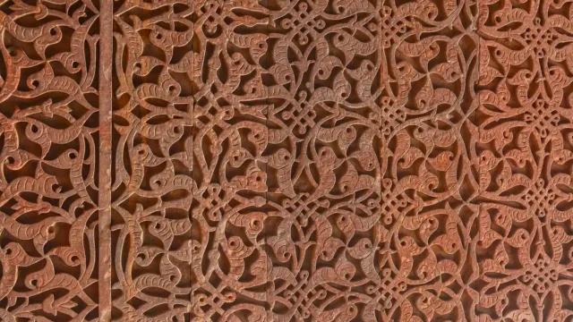 Art work on the wall of Qutb Minar Complex