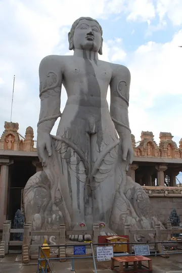 The Gommateshwara (Bahubali) statue at Shravanabelagola, Karnataka, about 983 CE, 57 feet high. The creepers on his limbs show how long he stood in meditation