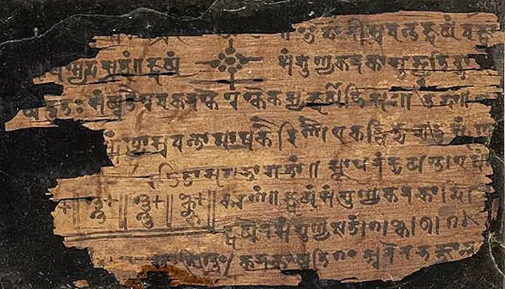 A leaf of the Bakhshali manuscript (found near Peshawar, 1881; Bodleian Library). Zero appears in it as a solid dot