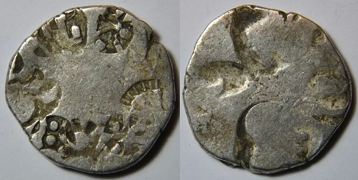 A silver punch-marked karshapana of Magadha (Nanda period, about 346–321 BCE), front and back