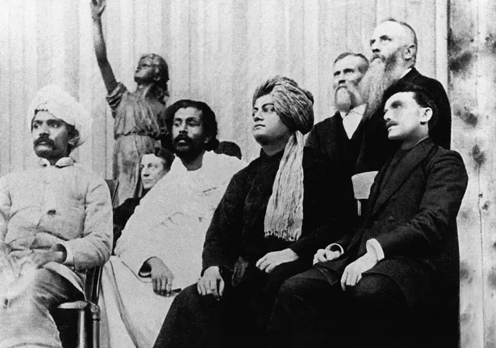 Swami Vivekananda (centre) with other delegates at the Parliament of Religions, Chicago, September
