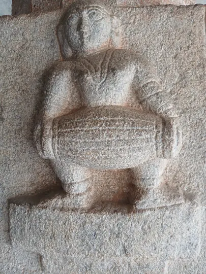 Mridangam player carved at the Bhoga Nandeeshwara Temple, Karnataka