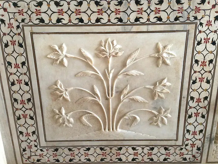 Marble relief and pietra dura borders inside the Taj Mahal